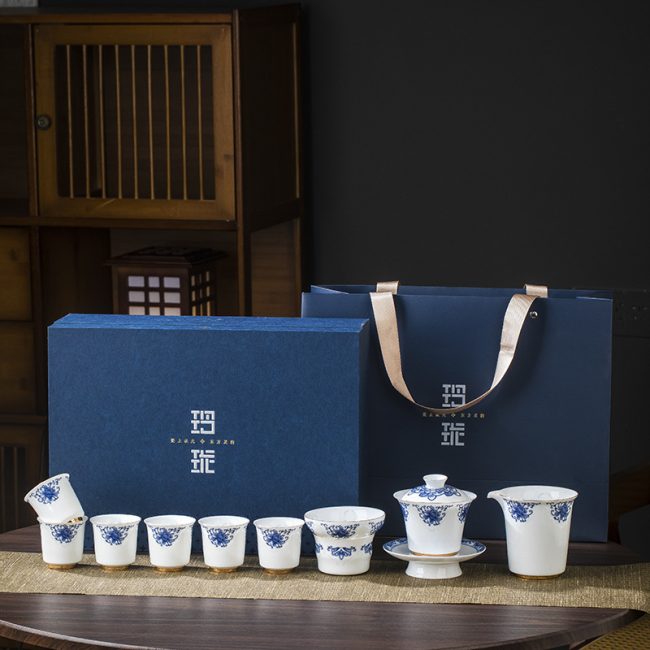 Jingdezhen Qinghua Linglong tea set cover bowl household high-grade ceramic kung fu tea set wholesale gift box new