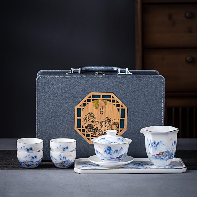 Jingdezhen ceramic kung fu tea set set of high-grade sheep jade set of gold cover bowl corporate gifts LOGO customized